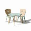 Wooden kids table and chair set with star cutouts in light green and natural color